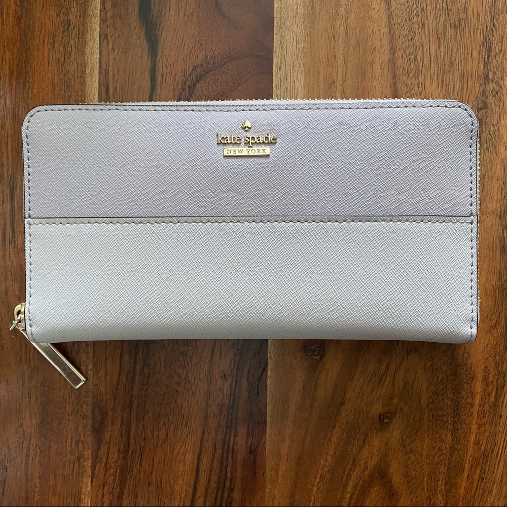 Kate Spade Spencer Zip around continental wallet in pale purple/gray purple